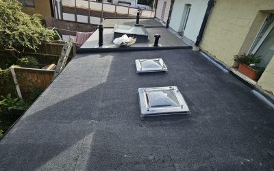Newly completed black felt flat roof with two new rooflights in Hook, Chessington